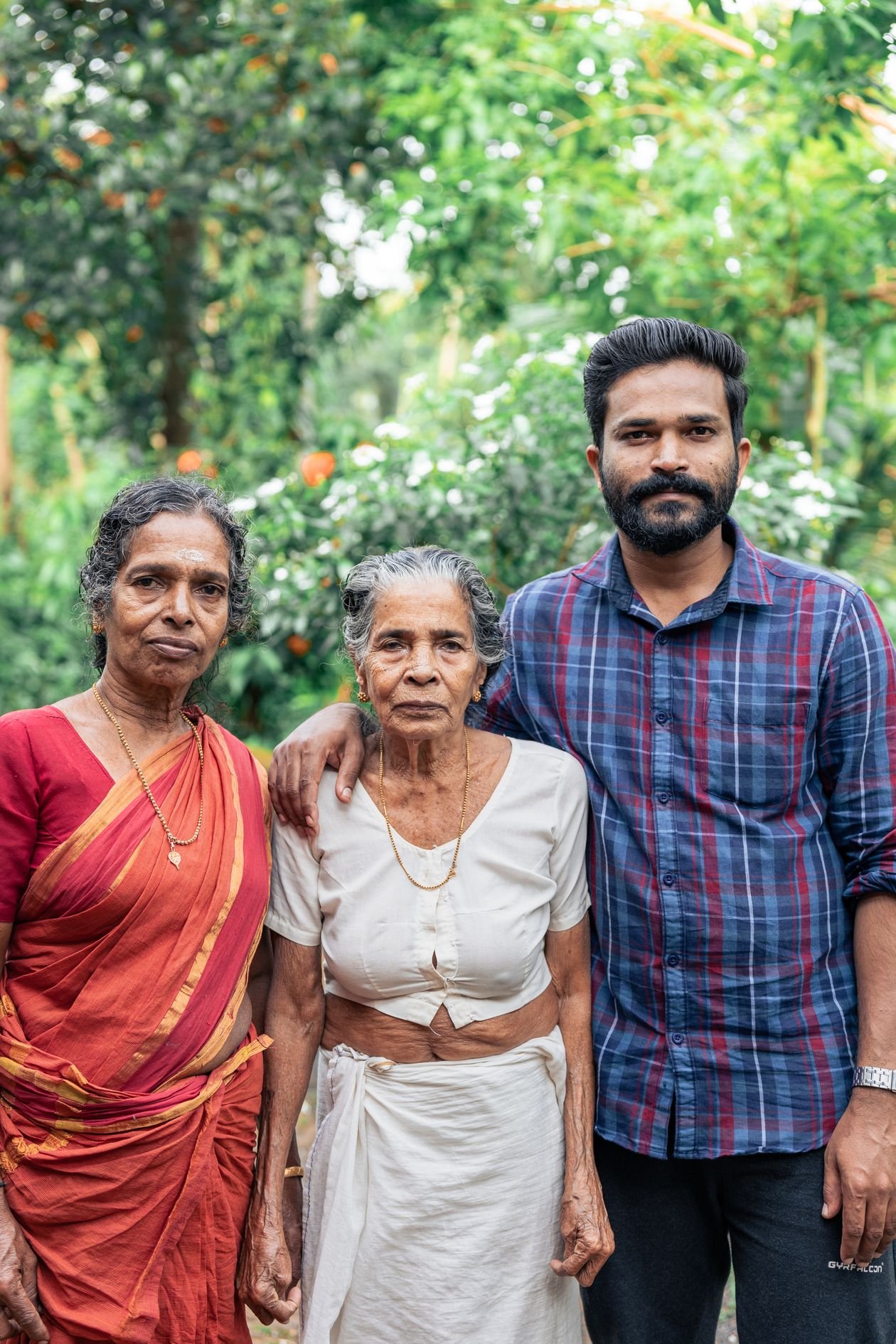 Three generations of an Indian family together outdoors